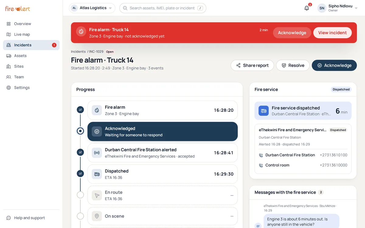 An open incident in the owner web app: fire alarm on Truck 14, acknowledged, Durban Central Fire Station alerted and dispatched with an ETA, and messages with the fire service
