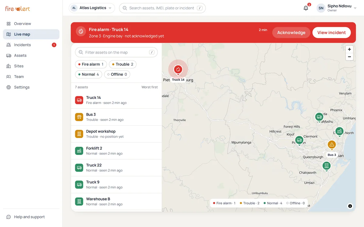 Firealert owner web app: the live map with a fire alarm on Truck 14 near Pietermaritzburg and the fleet's other assets around Durban